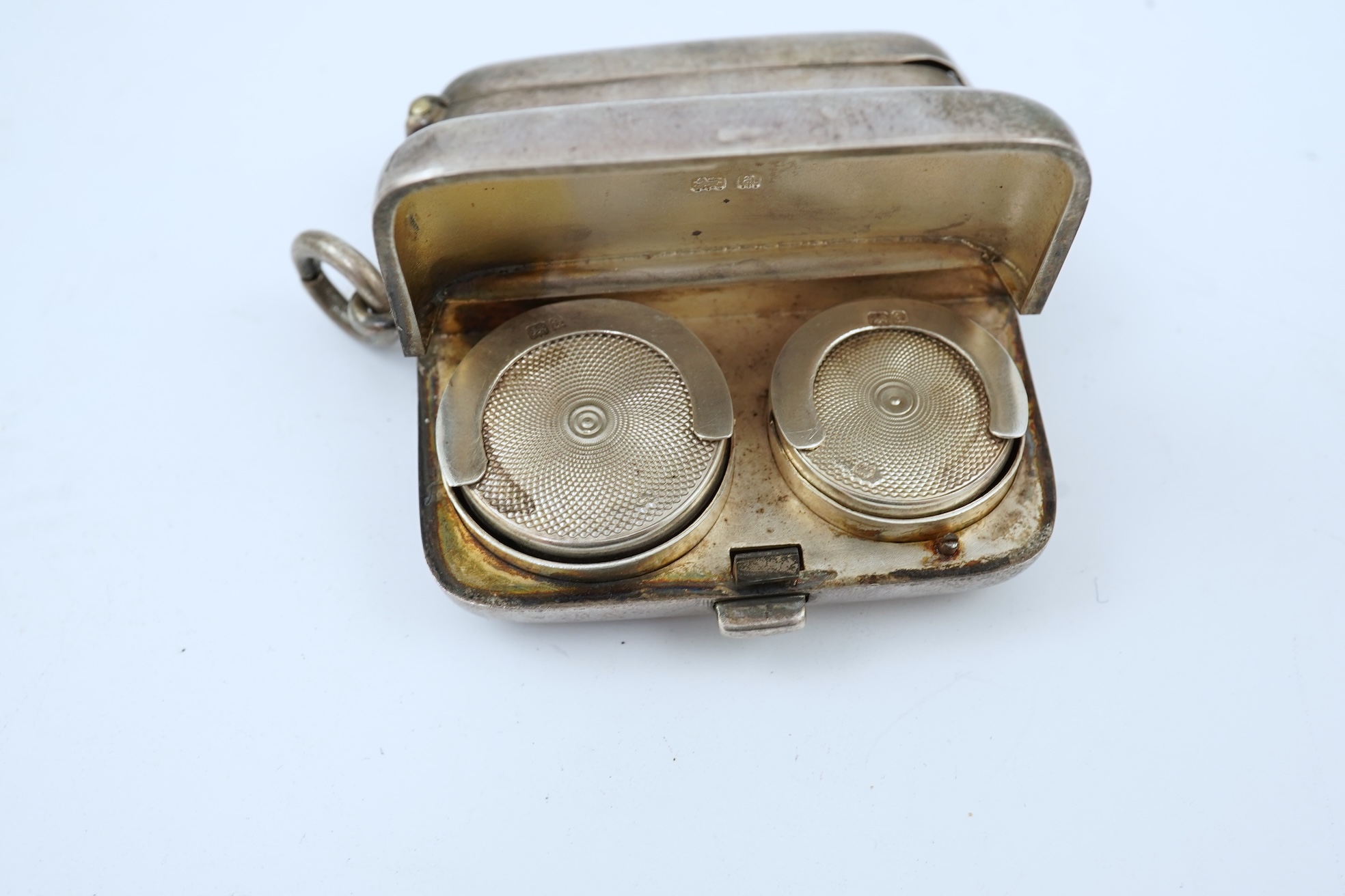 A late Victorian silver combination, cigar cutter, sovereign/half sovereign and vesta case by William Hair Haseler